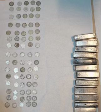 昆明海关向文物部门移交银币银条等700余件罚没文物